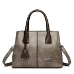 Collection sac à  main Sienna  gris détaill serpent porté bandoullière